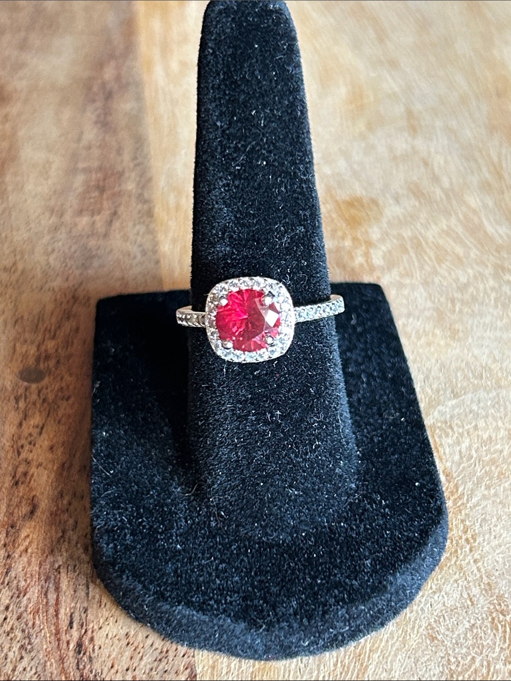 Sterling Silver Halo Ring with Red Center Stone
